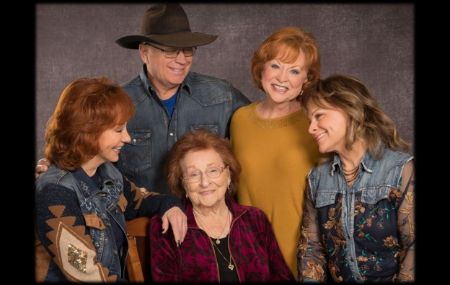 Reba with her family and mother